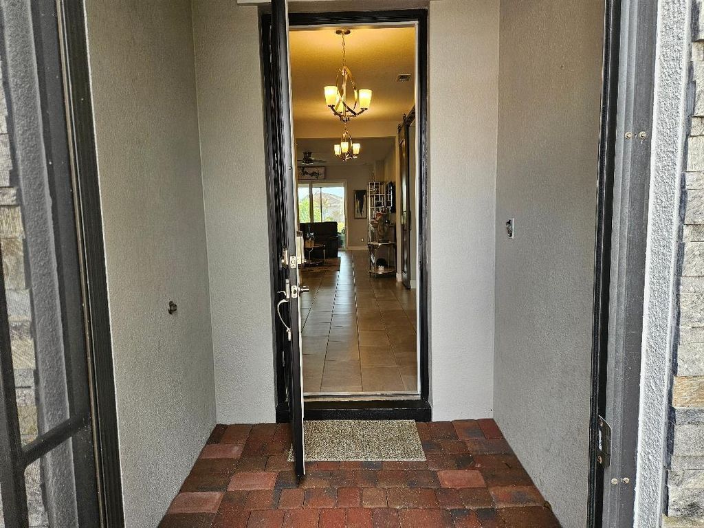 Photo of 12509 SW Silverwood Avenue, Port Saint Lucie, FL 34987 (MLS # R11165913)