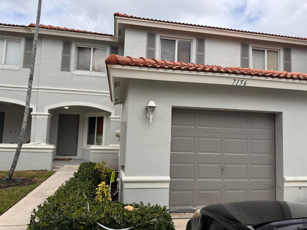 Photo of 7156 Hawks Nest Ter, Riviera Beach, FL 33407 (MLS # R10962045)