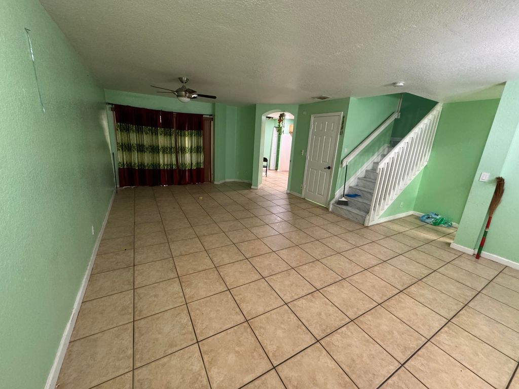 Photo of 7156 Hawks Nest Ter, Riviera Beach, FL 33407 (MLS # R10962045)