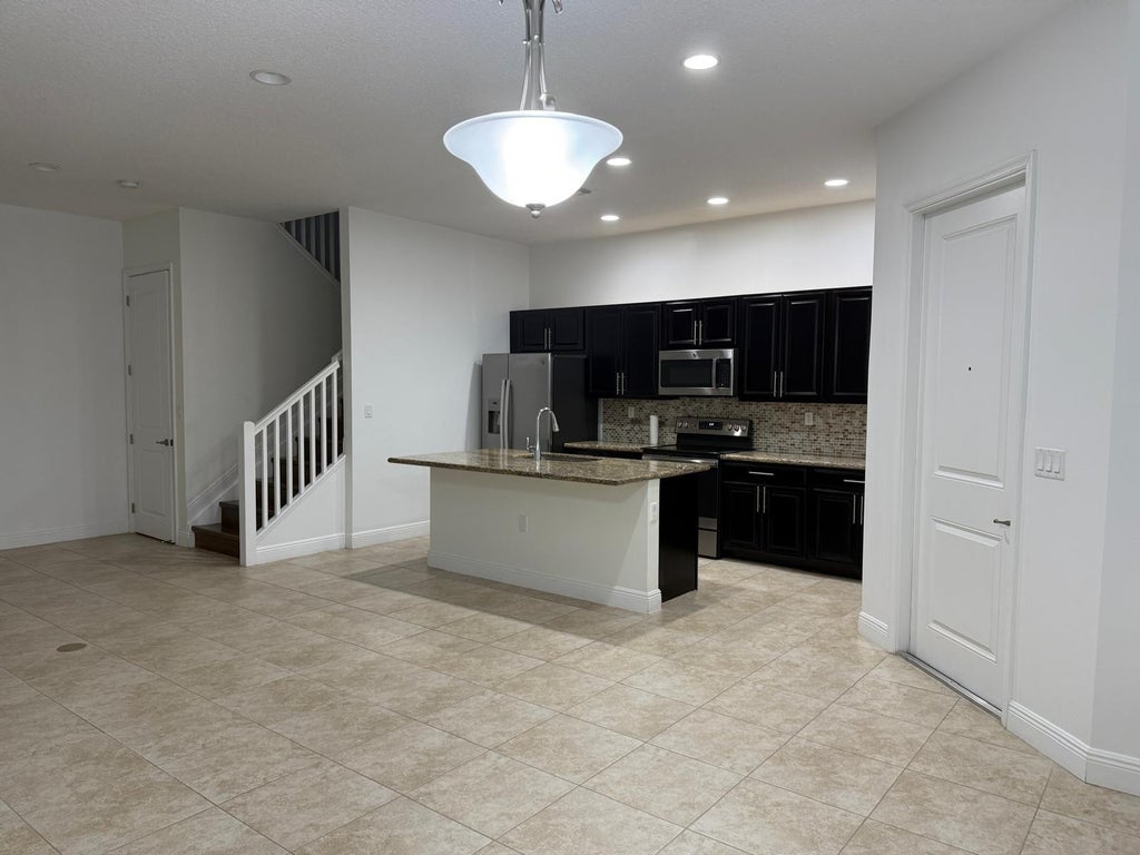 Photo of 12466 NW 17TH Court, Pembroke Pines, FL 33028 (MLS # B26066082)