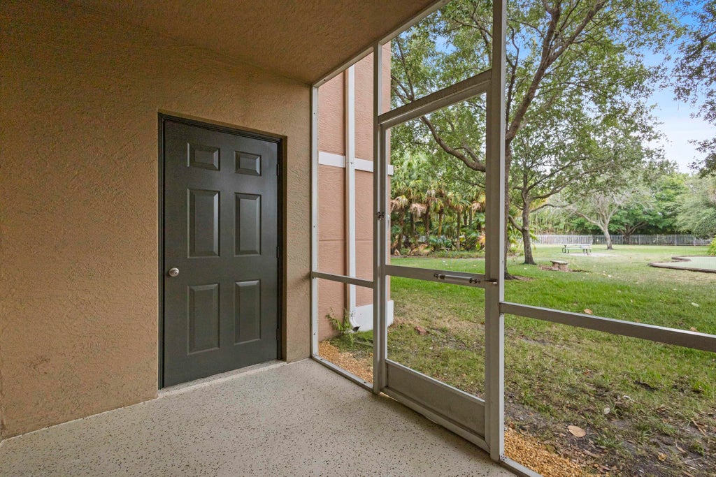 Photo of 6450 EMERALD DUNES Drive #103, West Palm Beach, FL 33411 (MLS # B26077142)
