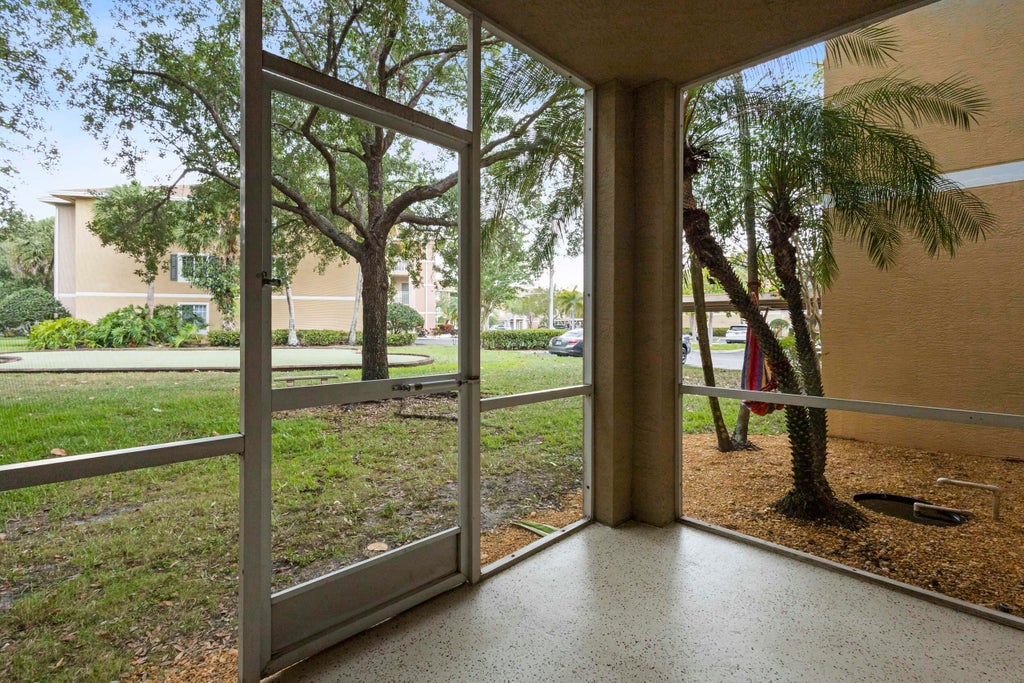 Photo of 6450 EMERALD DUNES Drive #103, West Palm Beach, FL 33411 (MLS # B26077142)