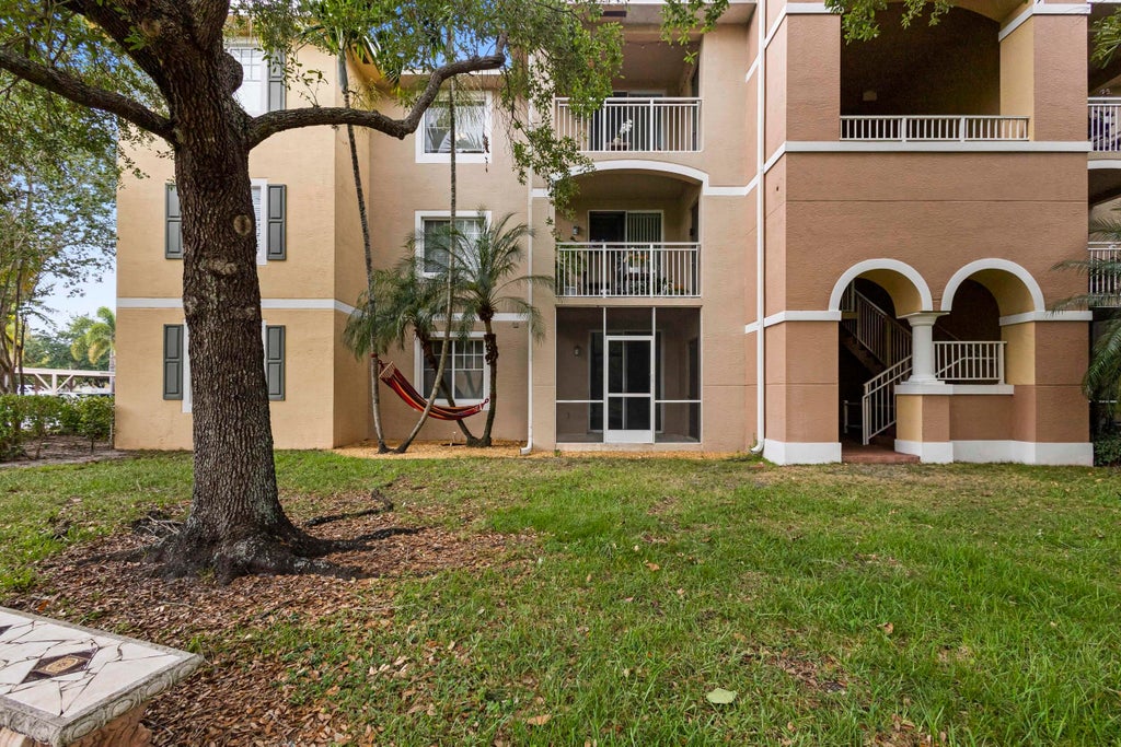 Photo of 6450 EMERALD DUNES Drive #103, West Palm Beach, FL 33411 (MLS # B26077142)