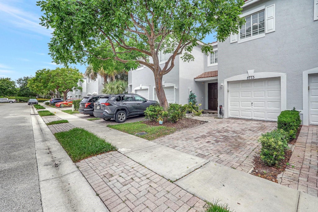 Photo of 8713 Cypress Walk Court, Tamarac, FL 33321 (MLS # F10506267)
