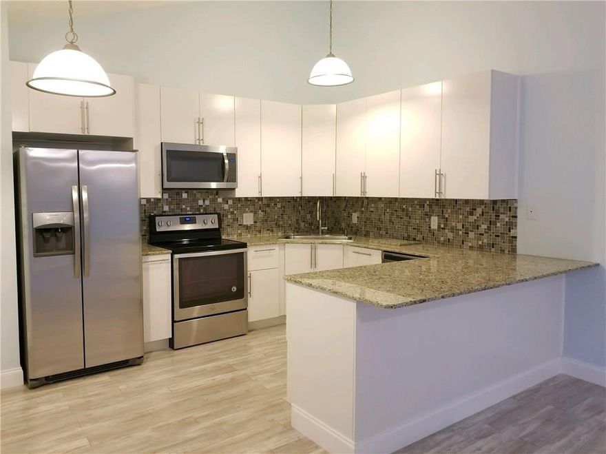 WELCOME TO YOUR BEACH INSPIRED HOME!! PETS WELCOME!! UPDATED 3 BED 2 BATH VILLA. NEW KITCHEN WITH 40" WHITE CABINETS, GRANITE COUNTERS WITH BFST BAR, SS APPLIANCES & PANTRY, COASTAL PINE FLOOR IN LIV AREAS AND MSTR BED. MSTR BED FEATURES; UPDATED BATH W/ VANITY & LG CLOSET. WASHER/DRYER IN UNIT, SPLIT BEDROOMS, FRESHLY PAINTED. LG FENCED AND SCREEN PATIO, ROOF: NEW METAL ROOF BEING INST. AC: 2014 WATER HEATER: 2017. BUYER CAP CONTR $510 RQRD. 2 PETS COMB WEIGHT 50 LBS
