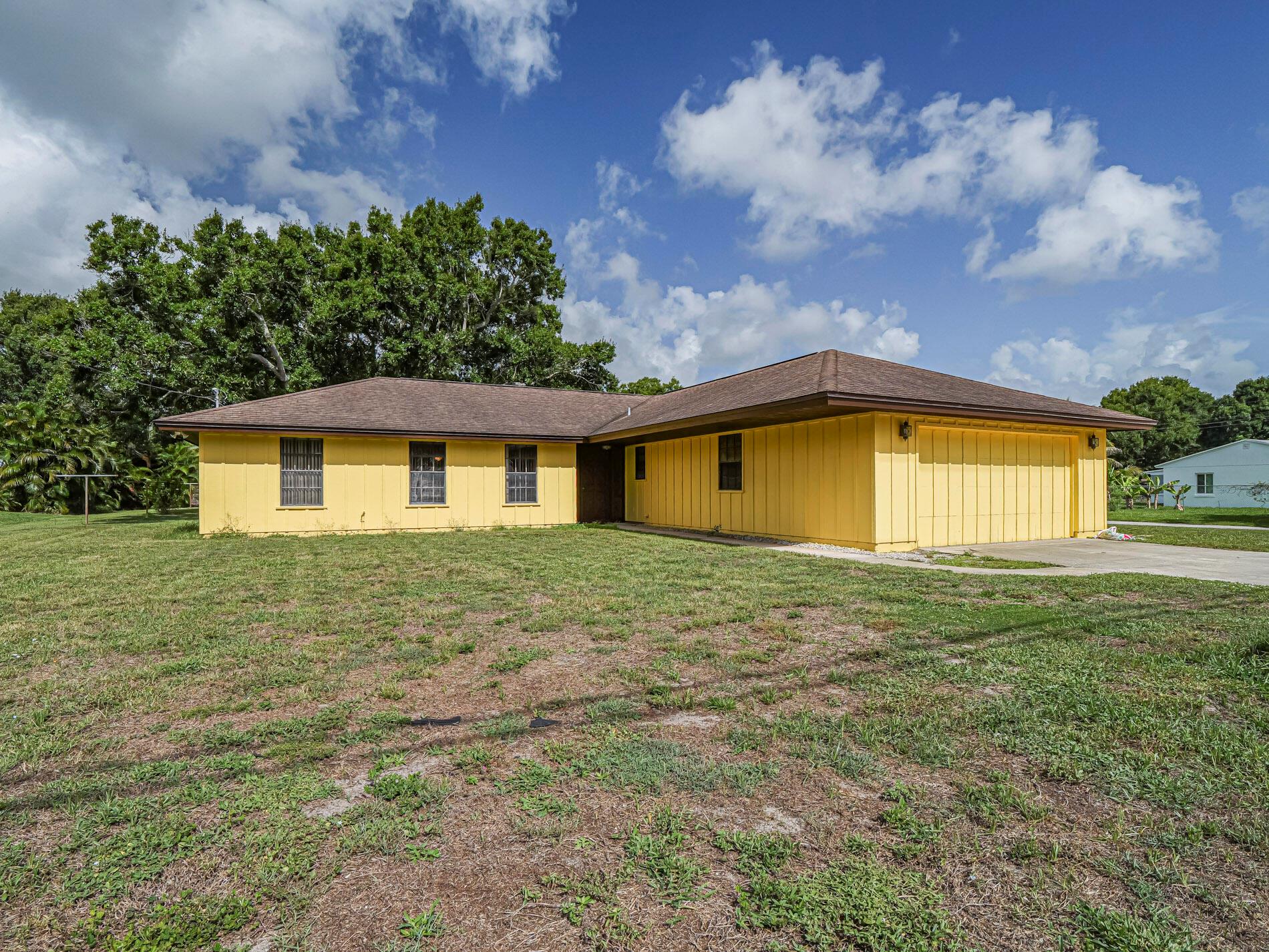 New Metal Roof in August! New AC & Drainfield and Re piped! Super Convenient Location to Schools, Shopping, Restaurants & Minutes to River & Beaches. Crown Molding, Split Plan, Master walk-in closet, Oversized Corner Lot & 2 Car Garage, Large Screened Porch & Laundry Room. Ready for your taste & interior upgrades to make it your own!