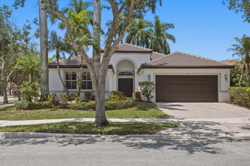 Photo of 1285 WINDSOR Lane, Weston, FL 33327 (MLS # B26066766)