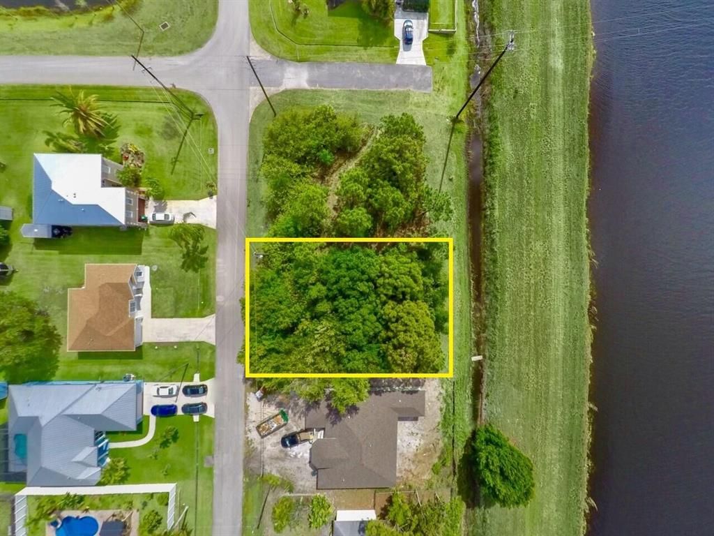 Photo of 1422 SW Abacus Avenue, Port Saint Lucie, FL 34953 (MLS # R10792215)