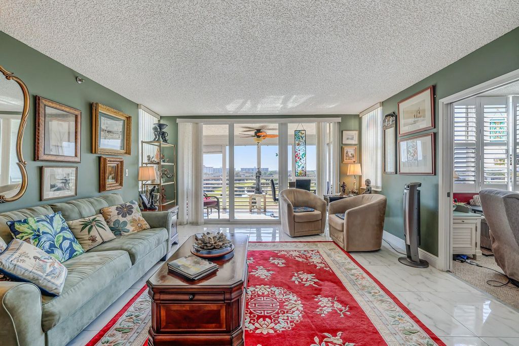 Photo of 3520 Oaks Way #809, Pompano Beach, FL 33069 (MLS # F10552118)