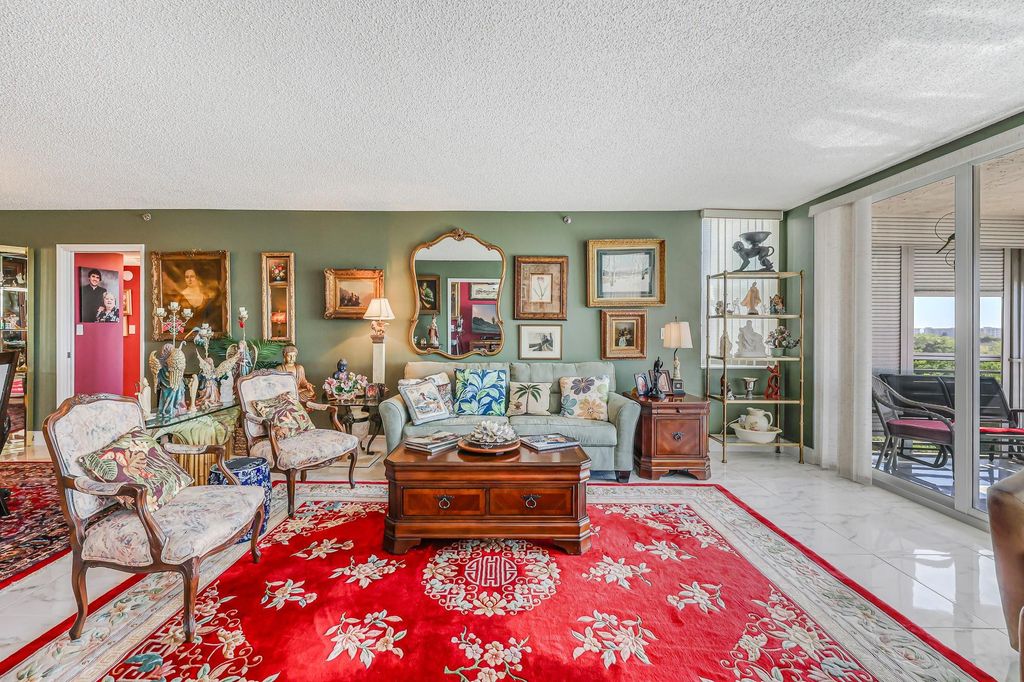 Photo of 3520 Oaks Way #809, Pompano Beach, FL 33069 (MLS # F10552118)