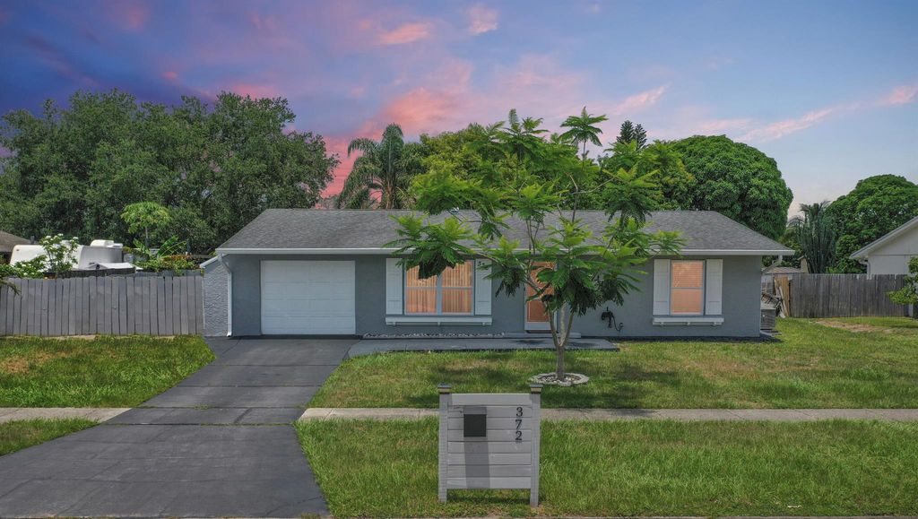 Photo of 372 NE Ardsley Drive, Port Saint Lucie, FL 34983 (MLS # R11101606)