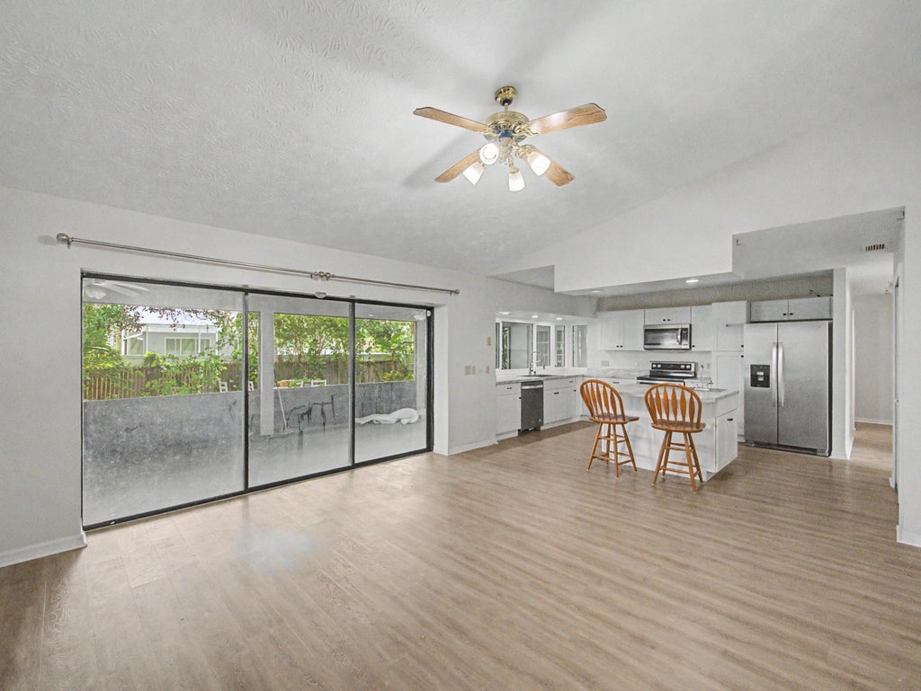Photo of 2301 SW ABNER Road, Port Saint Lucie, FL 34953 (MLS # B26059222)