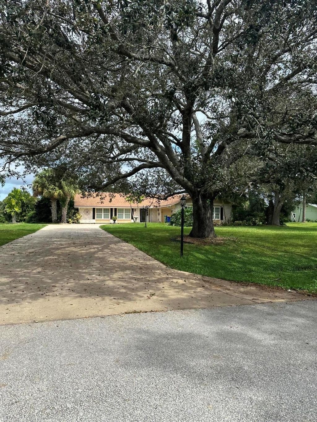 Photo of 2311 SW Racquet Club Drive, Palm City, FL 34990 (MLS # R10927005)