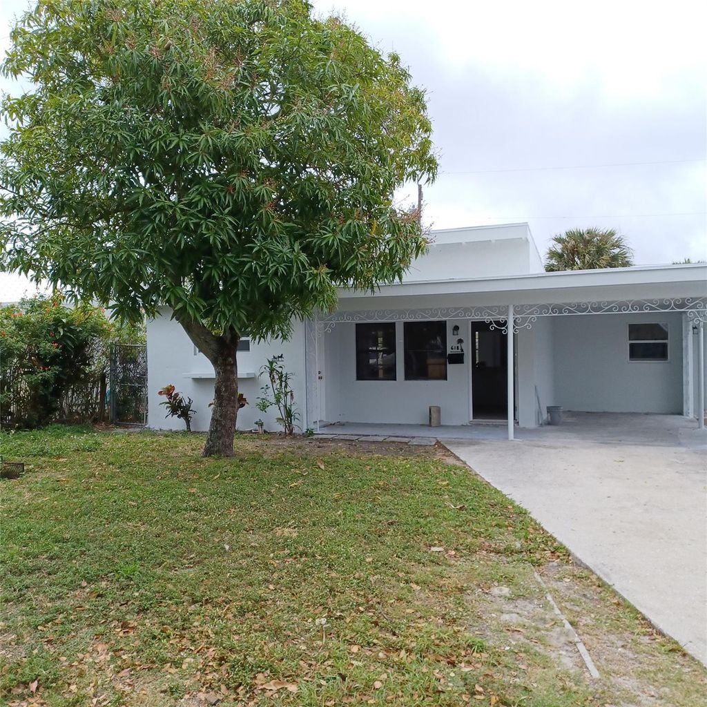 Photo of 618 58th Street, West Palm Beach, FL 33407 (MLS # B26021492)