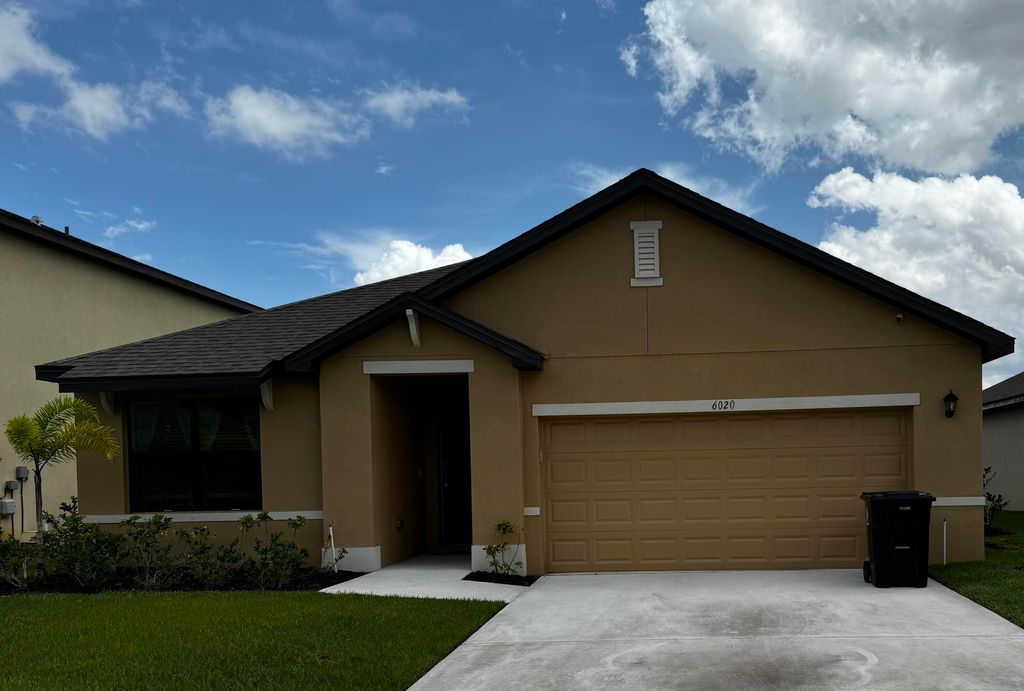 Photo of 6020 NW Regent Street, Port Saint Lucie, FL 34983 (MLS # R10994283)