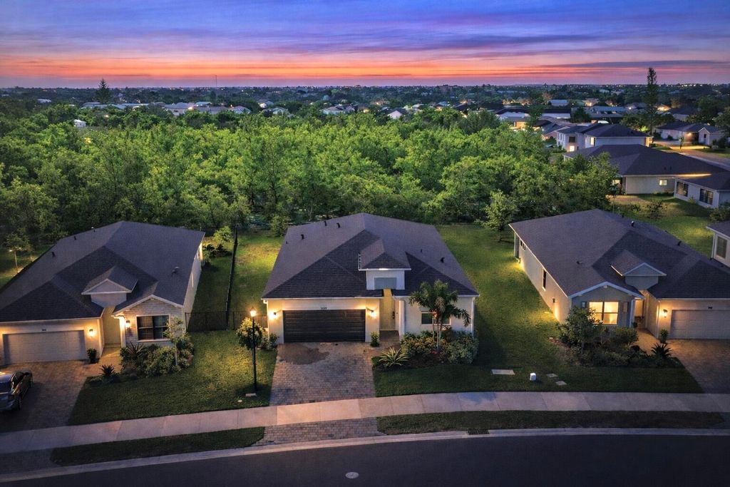 Photo of 2099 NE Cedar Drive, Jensen Beach, FL 34957 (MLS # R11167652)