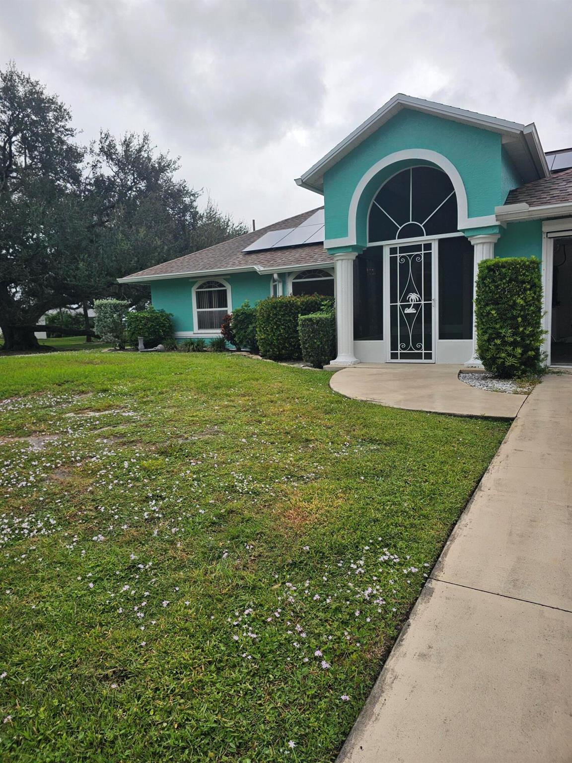 Wow - Stop!  This is it- home has it all!  This gorgeous pool home with screened lanai is ready for its new owner.  The lengthy list of amenities includes... AC in garage, dbl lot, 2 storage sheds, SOLAR PANELS that generate enough elect. for the entire home,  Fresh paint, new AC, New shower in 2nd ba, and a water condi. sys., just to name a few.  The owners suite is complete with en suite bath that includes double sink in granite topped vanity,  jacuzzi tub, separate shower and WIC.  There are 2 other nice sized bedrooms as well.  The kitchen is the center of the home and includes gorgeous cabinetry, stainless steel appliances and tiled backsplash. There is a formal living as well as den and a formal dining room, perfect for upcoming holiday gatherings. NO HOA!  Roof is 2017.