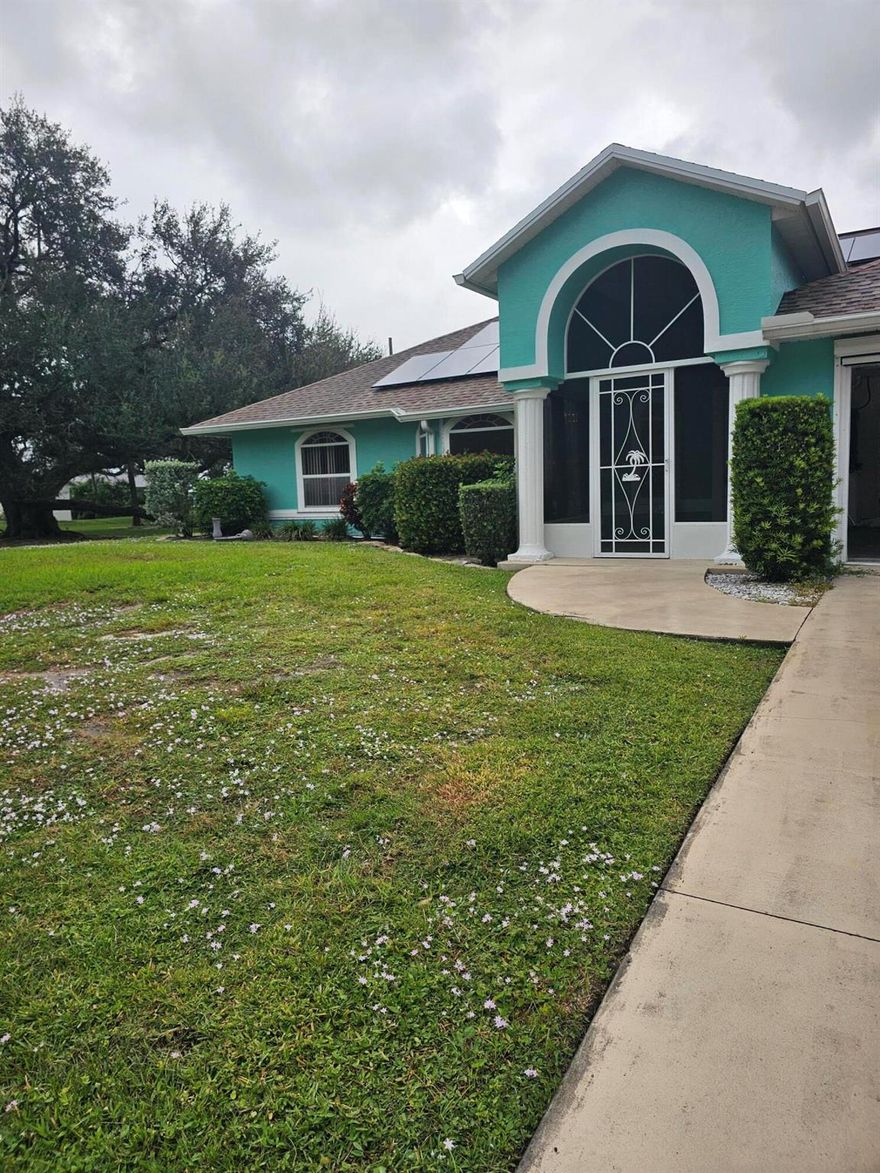 Wow - Stop!  This is it- home has it all!  This gorgeous pool home with screened lanai is ready for its new owner.  The lengthy list of amenities includes... AC in garage, dbl lot, 2 storage sheds, SOLAR PANELS that generate enough elect. for the entire home,  Fresh paint, new AC, New shower in 2nd ba, and a water condi. sys., just to name a few.  The owners suite is complete with en suite bath that includes double sink in granite topped vanity,  jacuzzi tub, separate shower and WIC.  There are 2 other nice sized bedrooms as well.  The kitchen is the center of the home and includes gorgeous cabinetry, stainless steel appliances and tiled backsplash. There is a formal living as well as den and a formal dining room, perfect for upcoming holiday gatherings. NO HOA!  Roof is 2017.