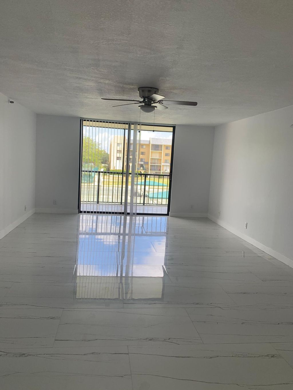 Photo of 2786 Tennis Club Drive #301, West Palm Beach, FL 33417 (MLS # B26019679)