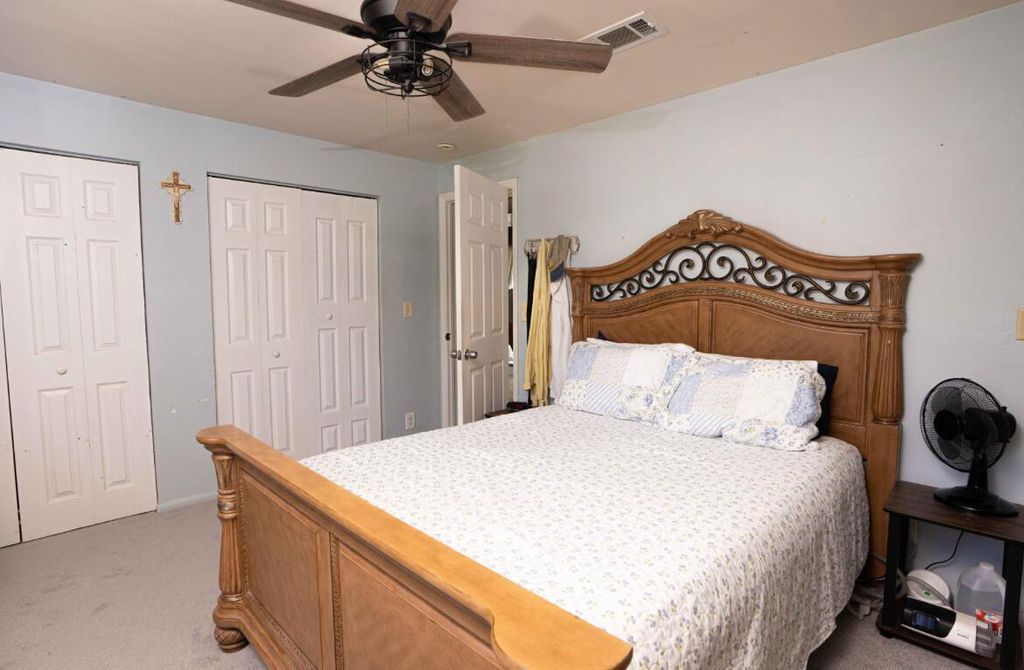 Photo of 1881 SE Manth Lane, Port Saint Lucie, FL 34983 (MLS # B26033356)