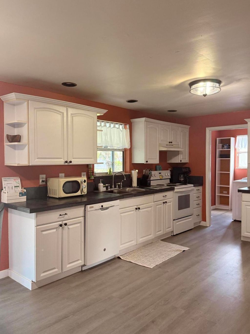 Photo of 1881 SE Manth Lane, Port Saint Lucie, FL 34983 (MLS # B26033356)