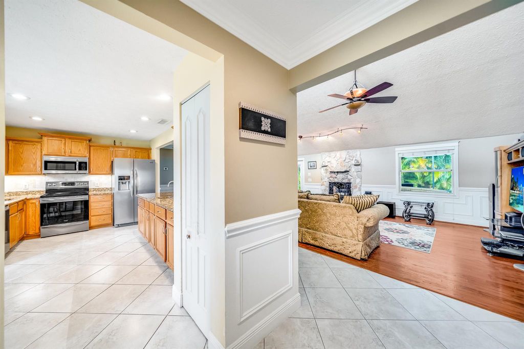 Photo of 2418 SW Mercer Street, Port Saint Lucie, FL 34984 (MLS # R10989775)