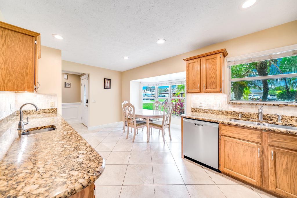 Photo of 2418 SW Mercer Street, Port Saint Lucie, FL 34984 (MLS # R10989775)