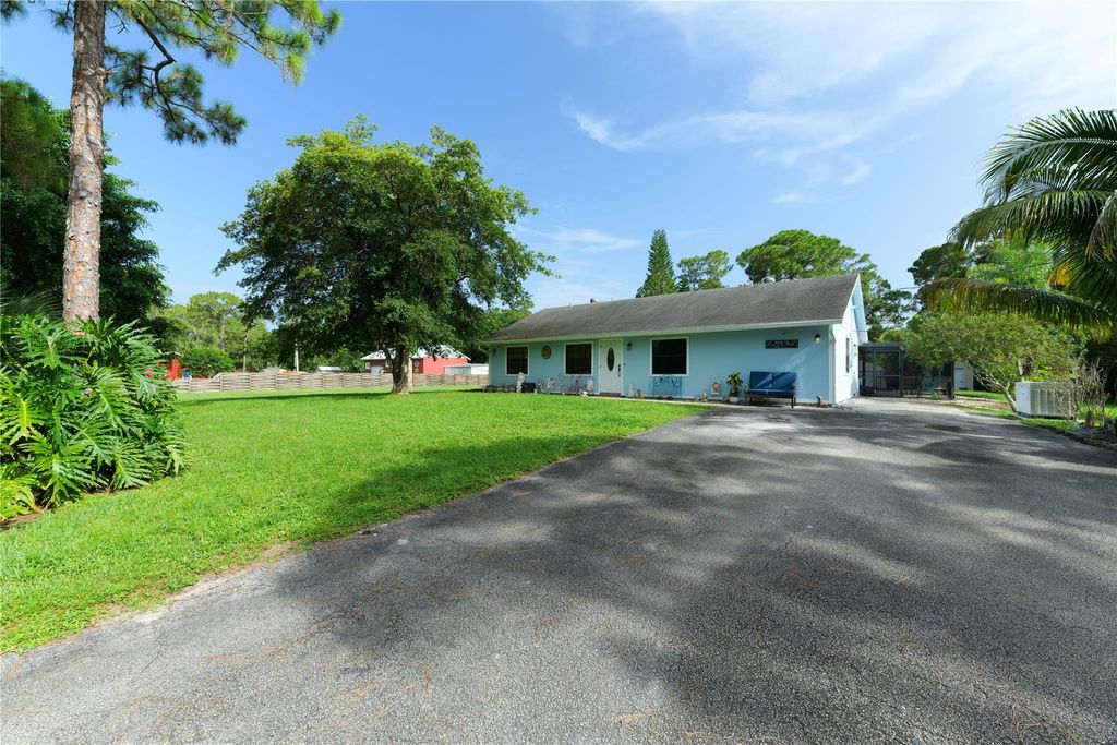 Photo of 12936 57th Rd, Royal Palm Beach, FL 33411 (MLS # F10390448)