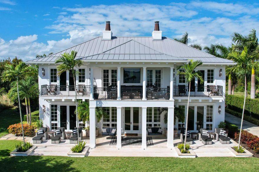 Nestled atop a serene hill with an exclusive view of the Intracoastal Indian River Lagoon, this waterfront oasis offers an unrivaled combination of Palm Beach elegance and the peaceful, modern lifestyle of Ft Pierce, Florida. Stepping into the foyer of this remarkable custom home, designed by the prestigious Janssen Architects of West Palm Beach, the discerning eye will immediately recognize the artistry and craftsmanship that went into creating this extraordinary residence. Every detail speaks to quality: state-of-the-art dock minutes to the ocean, award winning pool, artisan-wrought iron staircase, hand-carved Volte, custom-made lighting fixtures, exquisite fireplaces, & the warmth of Hickory hardwood floors underfoot. Soaring ceilings create an atmosphere of grandeur, elegance & space.