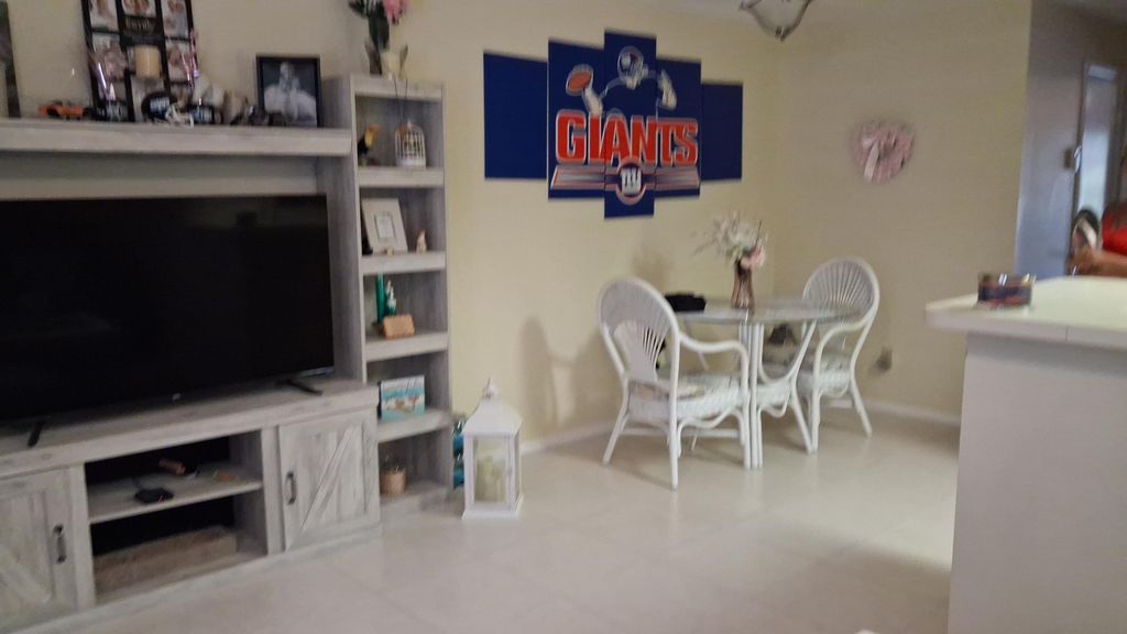 Photo of 23 Lake Vista Trail #204, Port Saint Lucie, FL 34952 (MLS # B26020466)