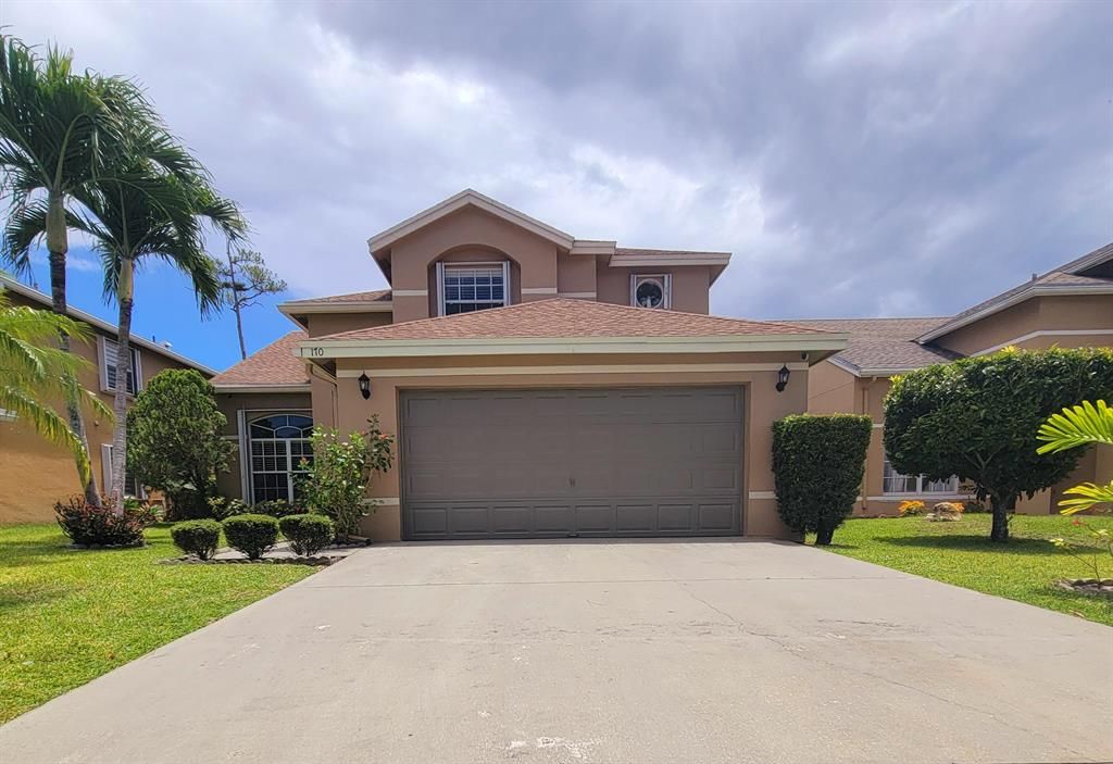 Photo of 170 Heatherwood Drive, Royal Palm Beach, FL 33411 (MLS # R10800228)