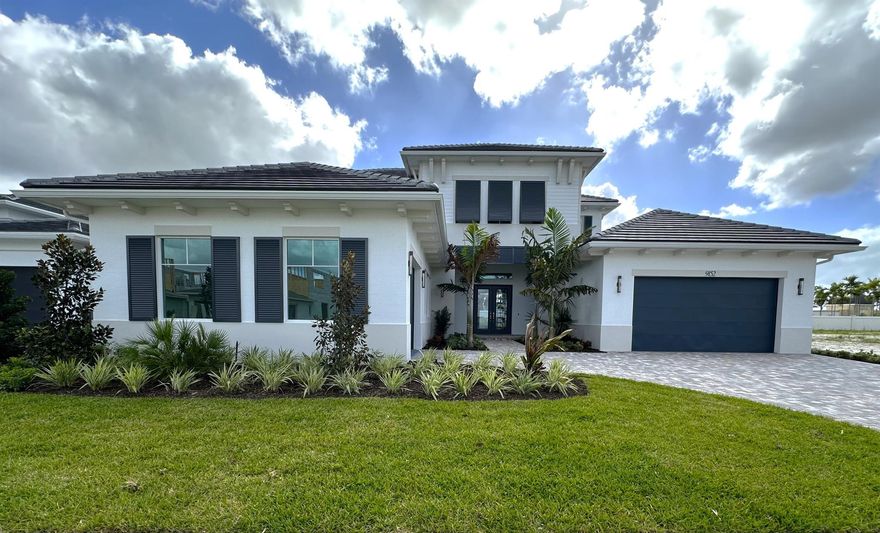 EST Q4 2023 COMPLETION.DRAMATIC 2-STORY, HIGHLY DESIRABLE DOMINICA PLAN IN EXCLUSIVE CORAL ISLES AT AVENIR! MASTER PLANNED, LIFESTYLE COMMUNITY WITH LOADS OF AMENITIES, FROM SEPARATE GOLF CART PATH TO TAKE YOU TO AN AMAZING 16,000 SQ FT CLUBHOUSE TO FABULOUS TOWN CENTER WITH SHOPS & DINING, 2,400+ ACRES OF ''RESTORED NATURAL LANDS'' WITH MILES OF WALKING & BIKING TRAILS, 20-ACRE FARM FOR FRESH PRODUCE, ETC!  DRAMATIC 12-FOOT CEILINGS, GRAND 10' SLIDING GLASS DOORS, LOW-E IMPACT GLASS, FREE-STANDING TUB IN MASTER BATH, FRONT LOAD WASHER/DRYER, LOADS OF UPGRADED FINISHES INCLUDING GE MONOGRAM(r) STAINLESS APPLIANCES PLUS SO MUCH MORE IN THIS HIGH-END ESTATE HOME. ATTENTION TO DETAIL BY ACCLAIMED PALM BEACH COUNTY LUXURY HOME BUILDER!
