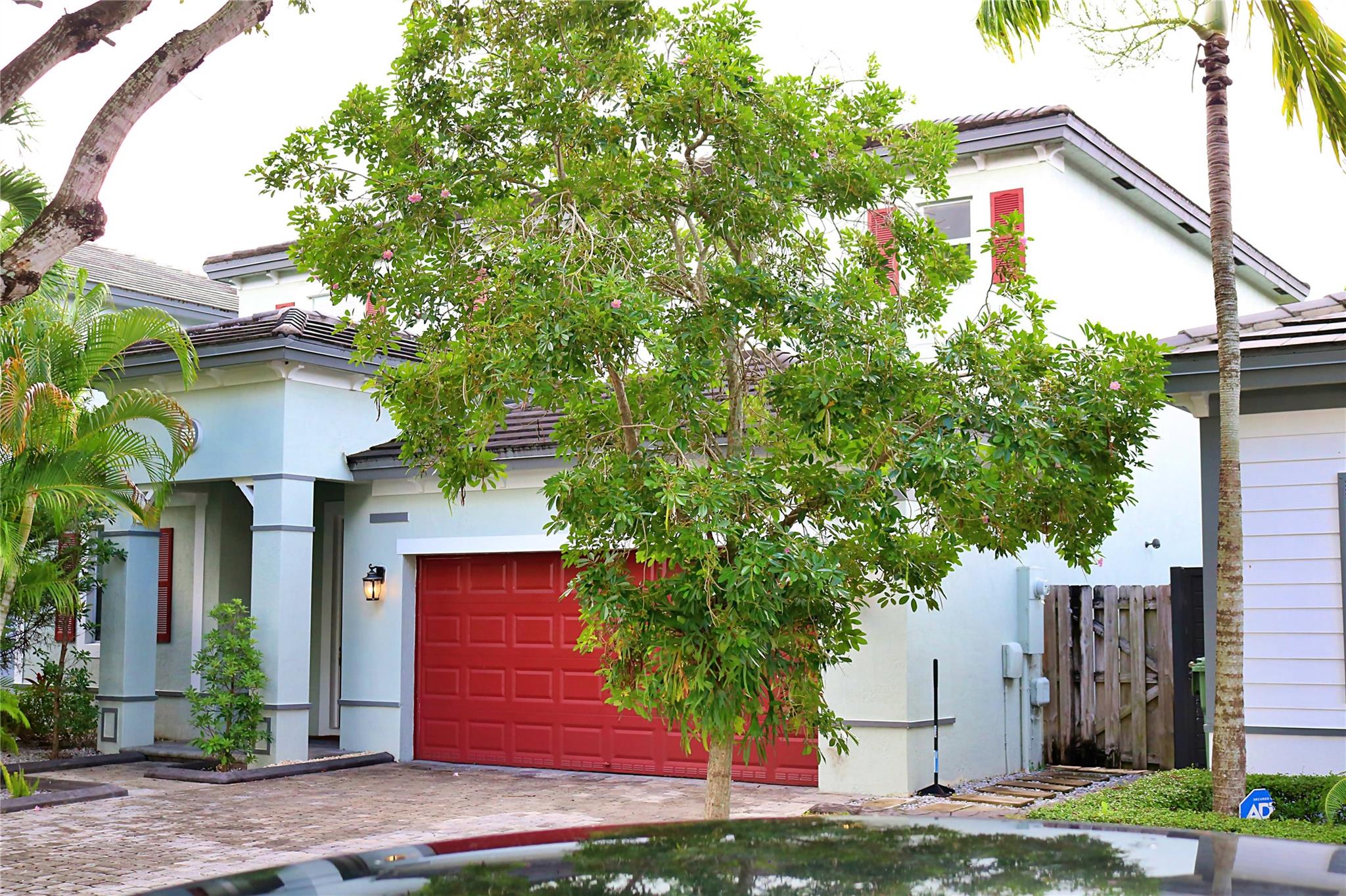 Discover your dream home at! This stunning 5-bedroom, 3-bath single-family residence offers spacious living and modern comfort in a beautiful waterfront setting. Enjoy serene lake views from your backyard, perfect for relaxing or entertaining. Featuring an open-concept layout, updated kitchen, and a large primary suite, this home combines elegance with practicality. Located in a gated community near top schools, parks, and shopping—this is South Florida living at its best!