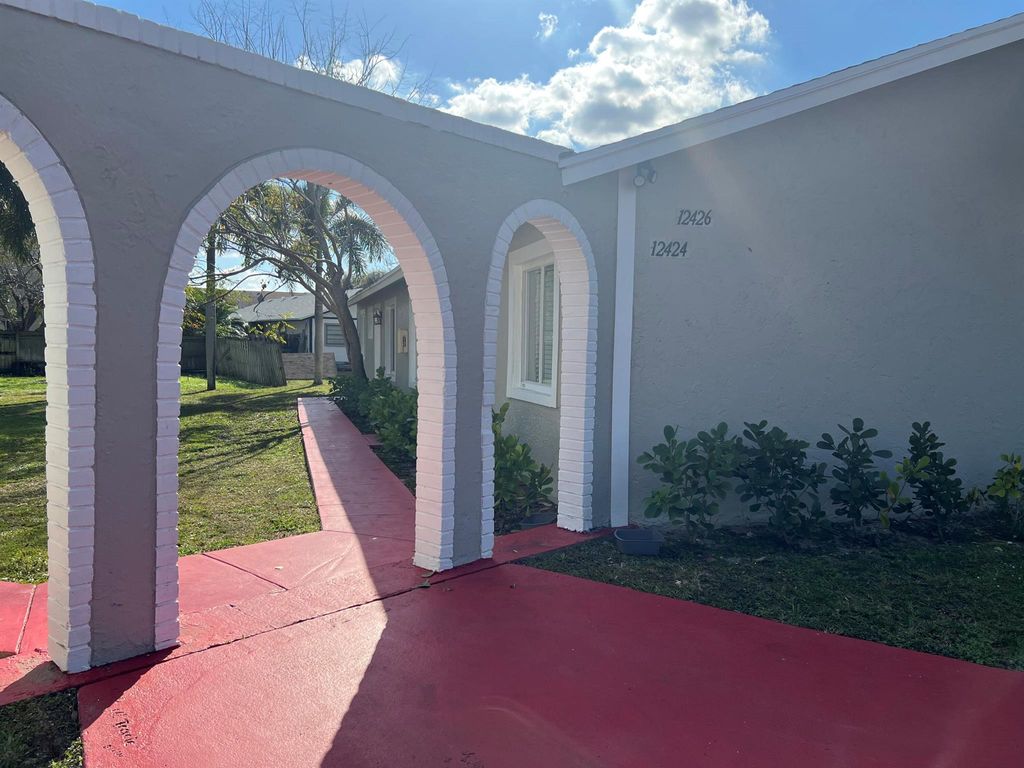 Photo of 12424 Peconic Court, Wellington, FL 33414 (MLS # R11060597)
