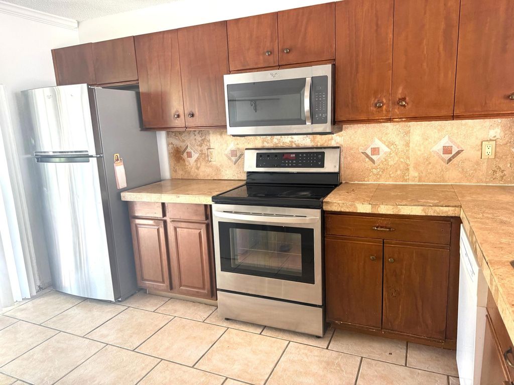 Photo of 795 Crystal Lake Drive #795, Deerfield Beach, FL 33064 (MLS # B26047254)
