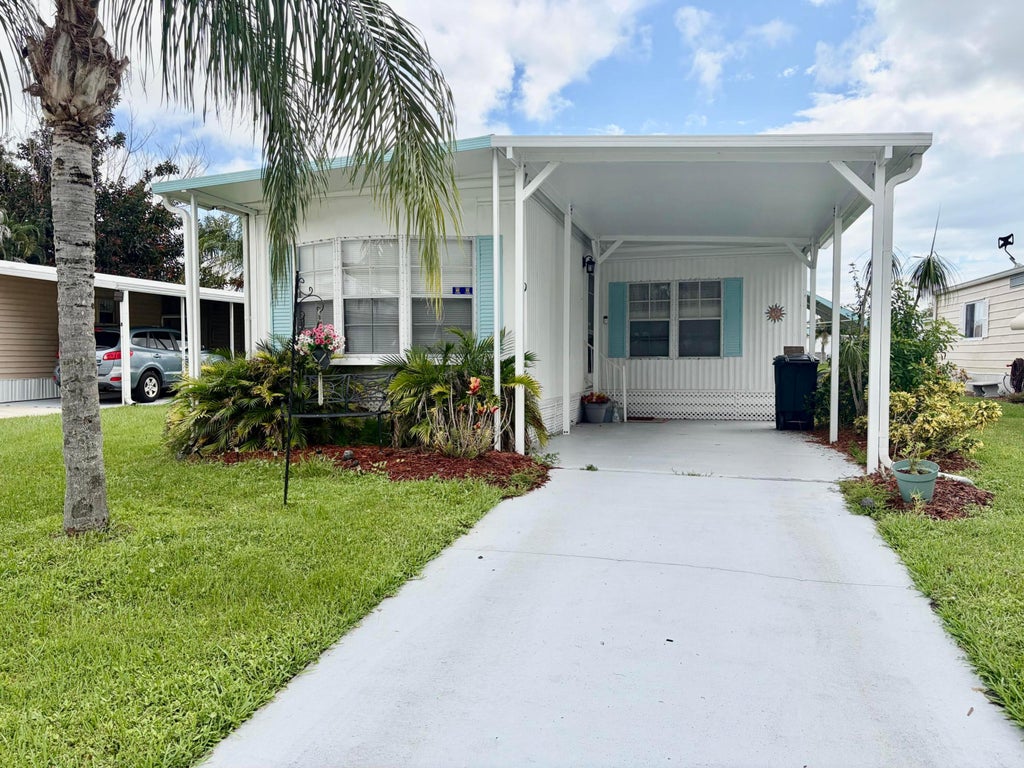 Photo of 10 La Paloma Lane, Port Saint Lucie, FL 34952 (MLS # B26076975)