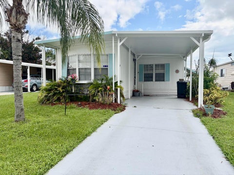 Photo of 10 La Paloma Lane, Port Saint Lucie, FL 34952 (MLS # B26076975)