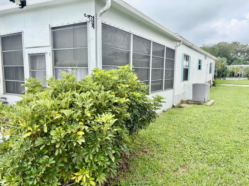 Photo of 10 La Paloma Lane, Port Saint Lucie, FL 34952 (MLS # B26076975)