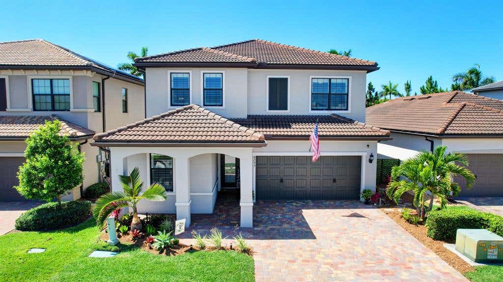 Photo of 8293 Hanoverian Drive, Lake Worth, FL 33467 (MLS # R10887184)