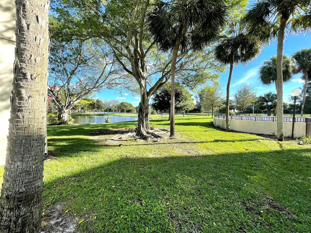 Photo of 2312 S Cypress Bend Drive #106, Pompano Beach, FL 33069 (MLS # F10411931)