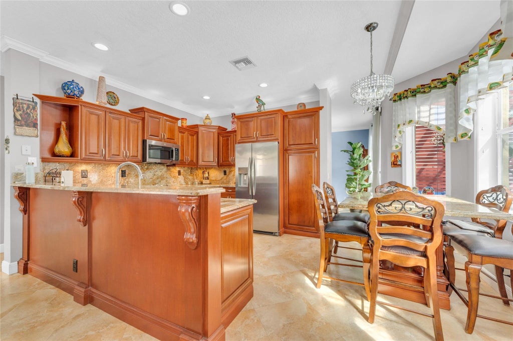 Photo of 5279 NW 112th Way, Coral Springs, FL 33076 (MLS # F10528795)