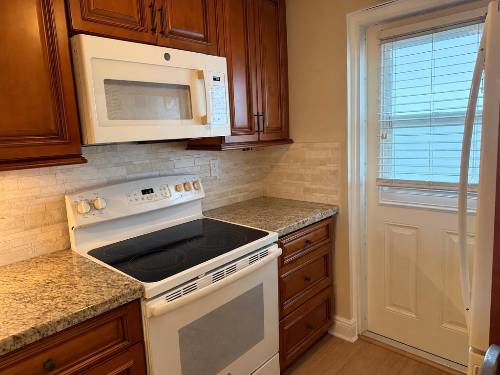 Photo of 1427 E Hillsboro Boulevard #Apt 528, Deerfield Beach, FL 33441 (MLS # B26082620)