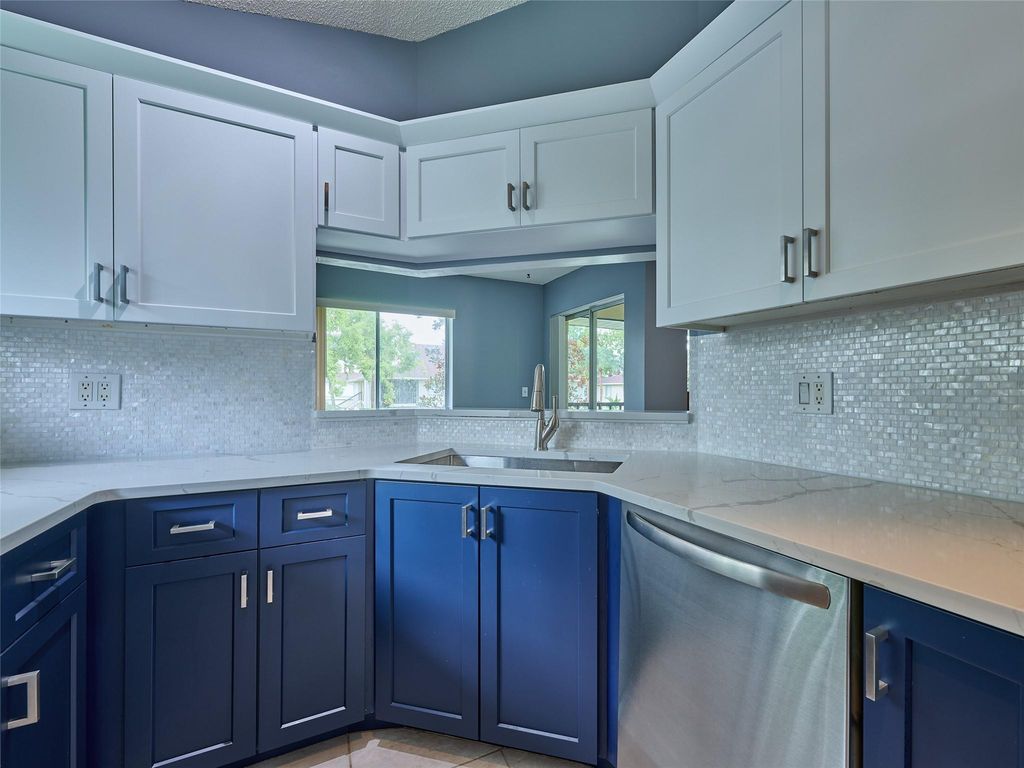 Photo of 6540 Chasewood Dr #F, Jupiter, FL 33458 (MLS # F10529400)