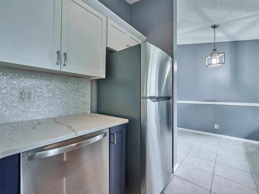 Photo of 6540 Chasewood Drive #F, Jupiter, FL 33458 (MLS # F10529400)