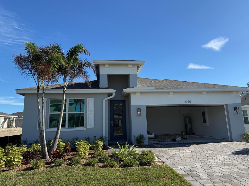 Photo of 1739 NE Ocean Dunes Drive, Jensen Beach, FL 34957 (MLS # R11047713)
