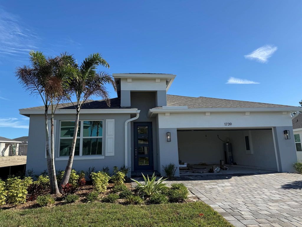 Photo of 1739 NE Ocean Dunes Drive, Jensen Beach, FL 34957 (MLS # R11047713)