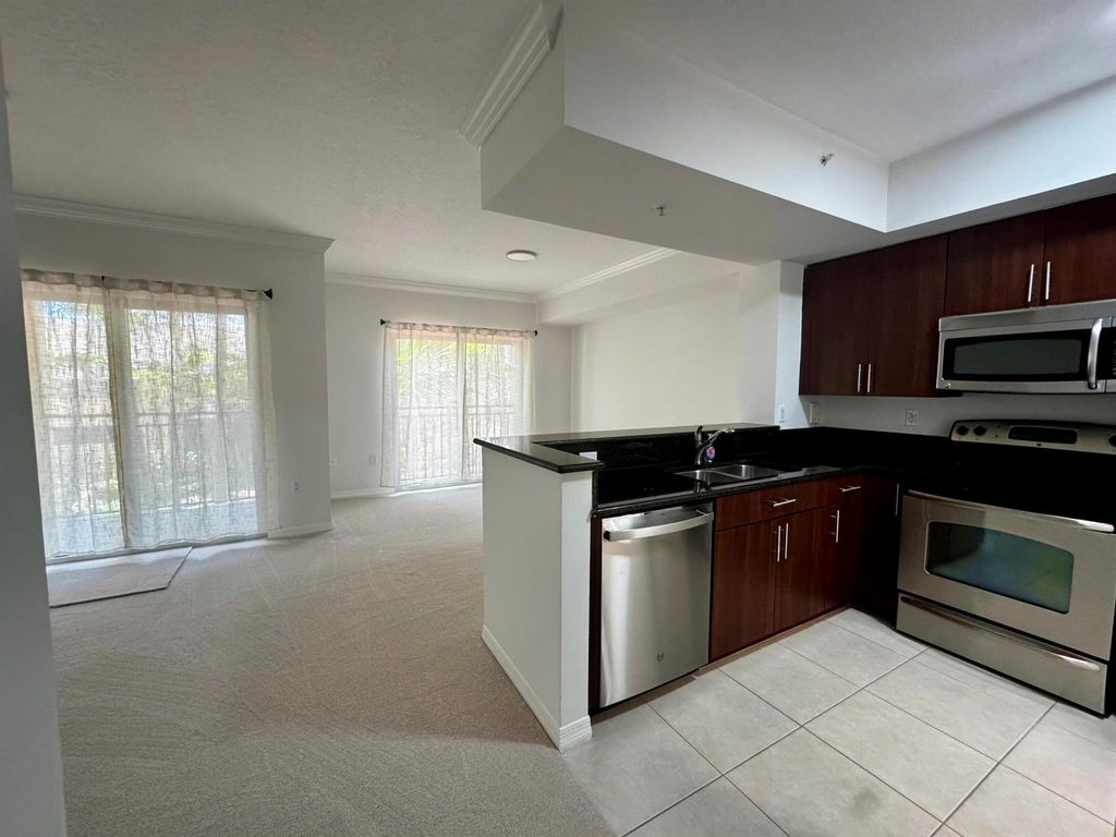 Photo of 4907 Midtown Lane #1204, Palm Beach Gardens, FL 33418 (MLS # R11081476)