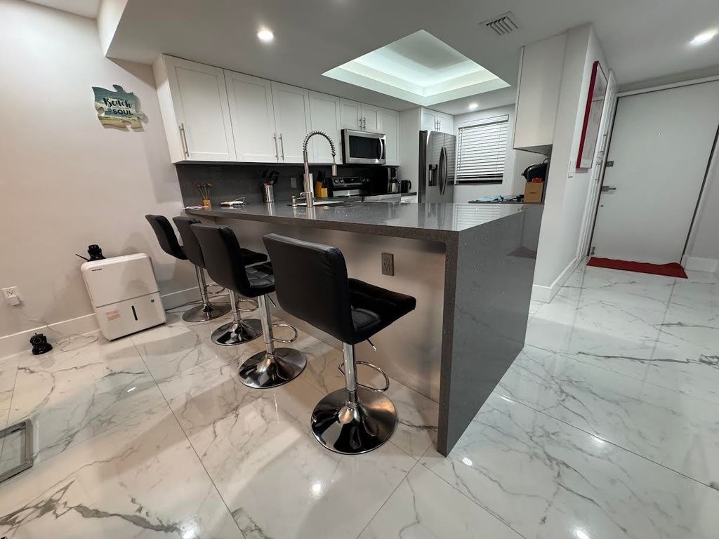 Photo of 3200 N Highway A1a #102, Hutchinson Island, FL 34949 (MLS # B26039562)