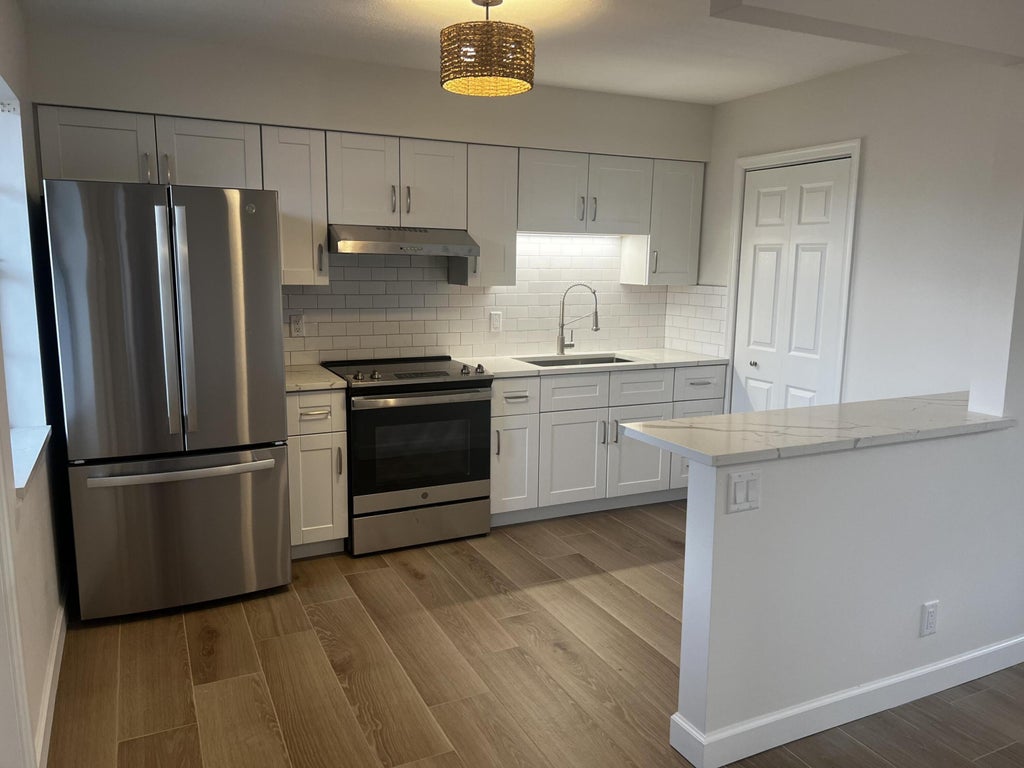 Photo of 609 NE 6th Court #B, Boynton Beach, FL 33435 (MLS # B26046482)