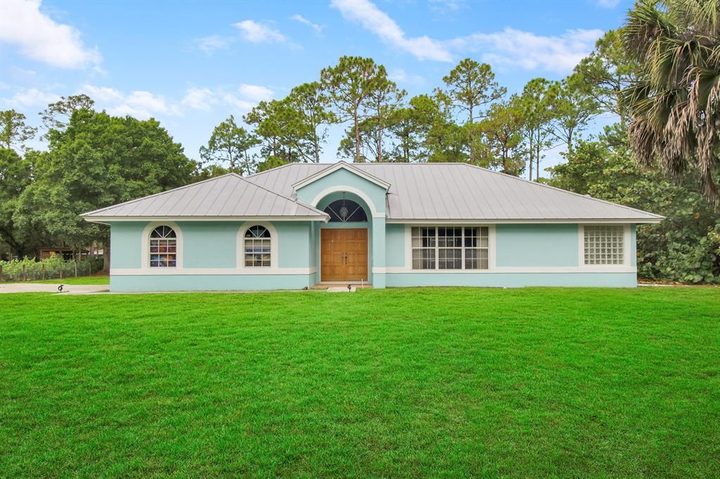 Photo of 15733 116th Terrace N, Jupiter, FL 33478 (MLS # R10884854)